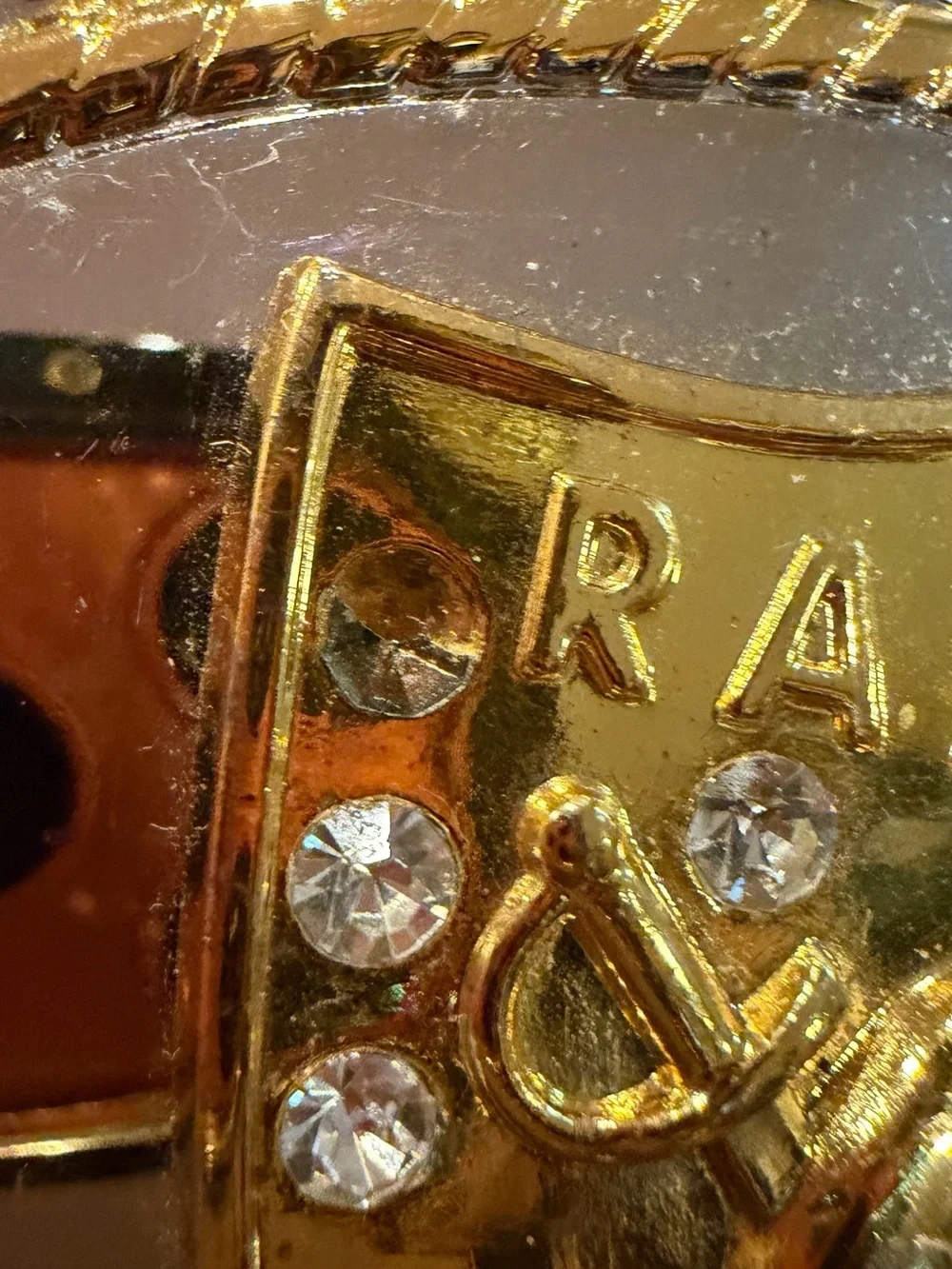 Source Unknown Gold and Silver Raiders Oval Crystal Belt Buckle